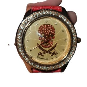 Skull & Cross Swords Watch featuring a Crystal-Studded Bezel and Red Band.